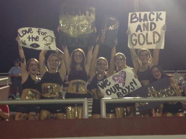 Seniors Kelsey Hill, Rachel Hudek, Maddie Waller, Caroline Miller, Cameron Jones, and Marin Donnelly cheer on the Plant Panthers. The dedicated football fans left school early in order to undertake the four hour drive to Georgia.
(Source:Caroline Miller)

