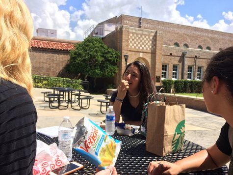 Despite the grade difference, Kate Prest can be spotted having lunch with seniors Carolina Santiago and Hannah Patterson.