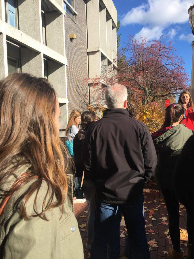 Anna Renou, senior, listens to her tour guide talk about the options for clubs at Boston University. 