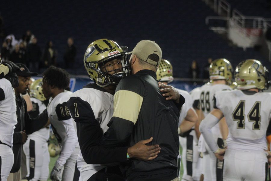 Whop Philyor senior, says goodbyes to Coach Marve after 45-6 loss against St. Thomas Aquinas.