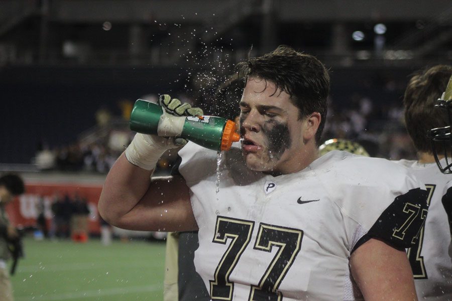 Scotty Rogers junior, hydrates before state championship game in Orlando, FL.
