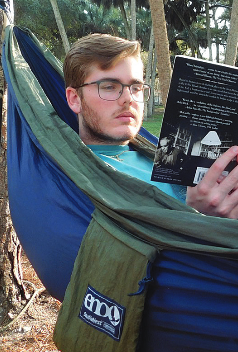 Reading a book while laying in his Eno, senior Stephen Jenkins’ go-to spot is at Swann Circle Park. This is an ideal spot for those who want to relax in quiet.