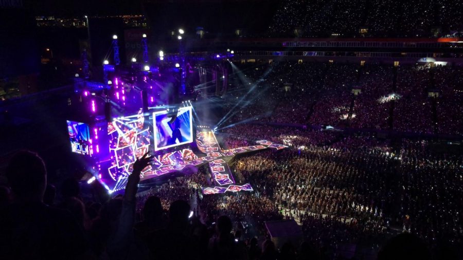 In+front+of+50%2C000+fans+Taylor+Swift+sings+her+Billboard+hit+%E2%80%9CLove+Story%E2%80%9D+on+Aug.+14+at+Raymond+James+Stadium.+As+fans+sang%2C+their+light+up+bracelets+were+glowing+the+dark.