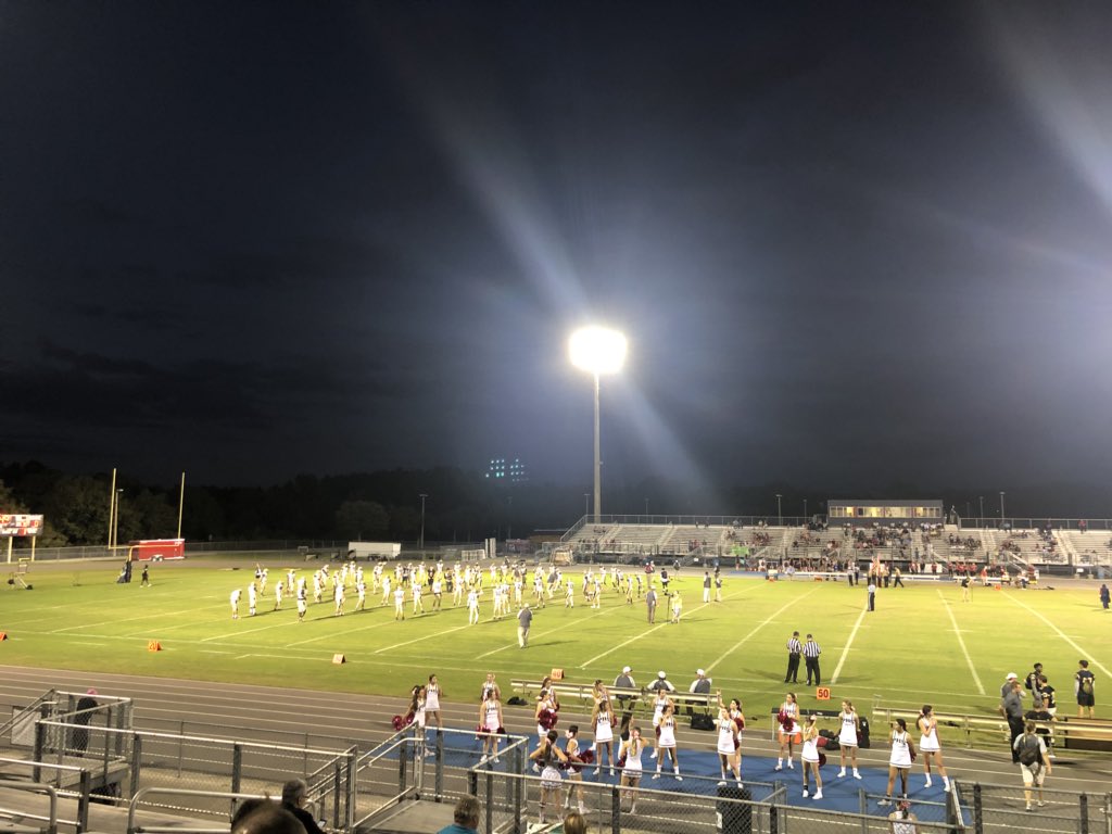 Warming up on the field, the varsity football team runs through drills. They defeated Freedom 42-3 Oct. 19.