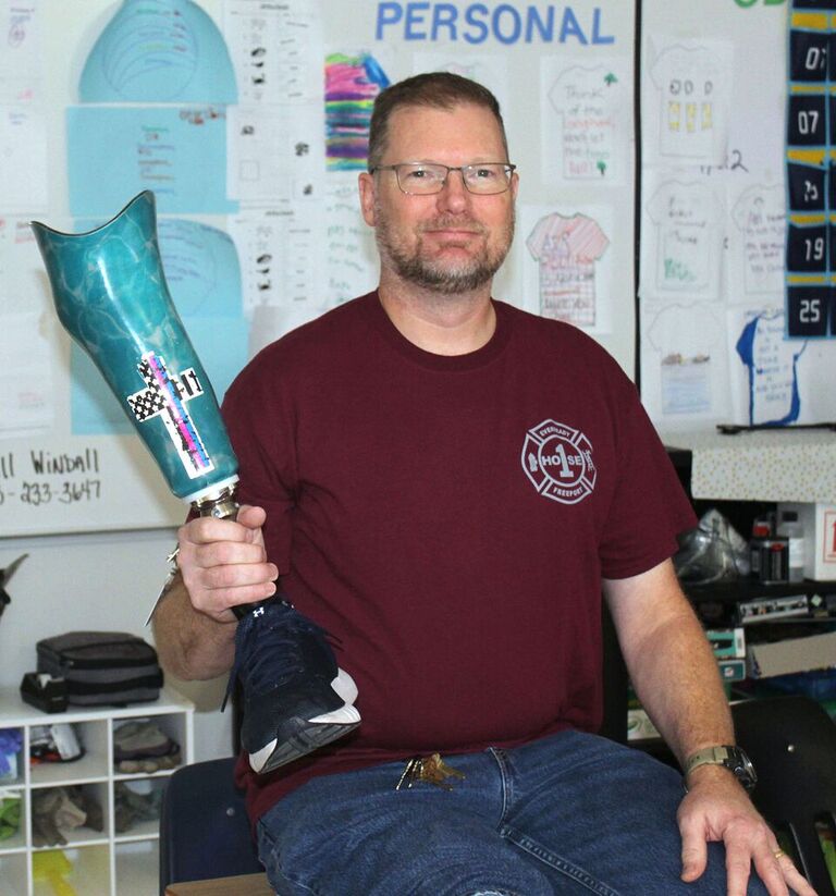 Chemistry teacher Jeffrey Keene’s leg was crushed by a firetruck when he tripped and fell at his old job as a firefighter. Keene lost his leg below the knee at age 19 and has since learned to live with a missing limb.