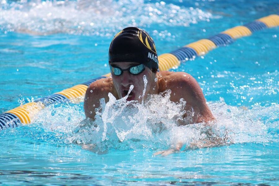 Swimming in the men’s 100-yard breaststroke, sophomore Tommy Nagle places second behind Strawberry Crest High School Friday, Oct. 5 at Bobby Hicks. The boys team secured third overall with a total of 85 points. 