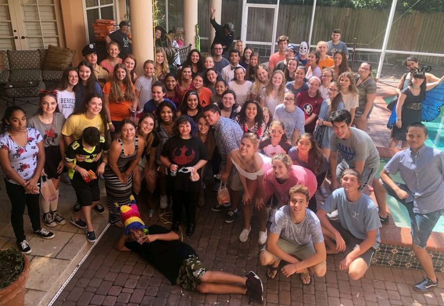  Hosting their first club meeting of the year, Best Buddies members celebrate Halloween with a piñata, a mummy wrap game and pizza Oct. 14 at senior Andrew Bensonoff’s house. Bensonoff said he felt that the Halloween matching party was important because some members of the club are not as involved or don’t have time during school to stop by the Best Buddies room, so this event allowed them to personally meet their buddy.