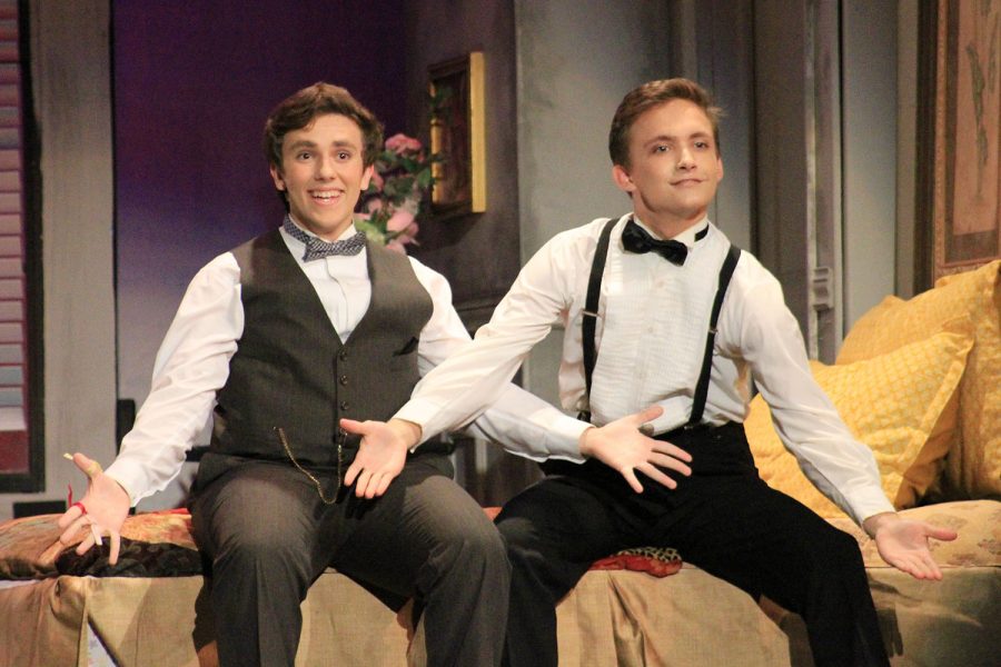 Waiting for applause, junior Jason Calzone and senior Rhett Renaud finish the tap number “Cold Feet” in theater’s production of “The Drowsy Chaperone” in the auditorium April 5. Calzone played George, the best man, and Renaud played Robert Martin, the groom. 