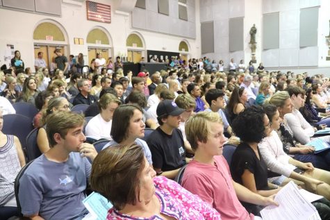 Parents and seniors listen as Plants college counselors and representatives of several Florida colleges speak at senior night on August 23. The event is hosted annually to supply seniors with information about the college application process. 