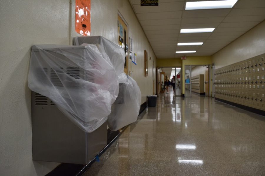 A plastic bag covers the water fountains in upstairs main hall to prevent students from using them during the boiled water notice Aug.16. The notice lasted a week and ended on Aug.23.