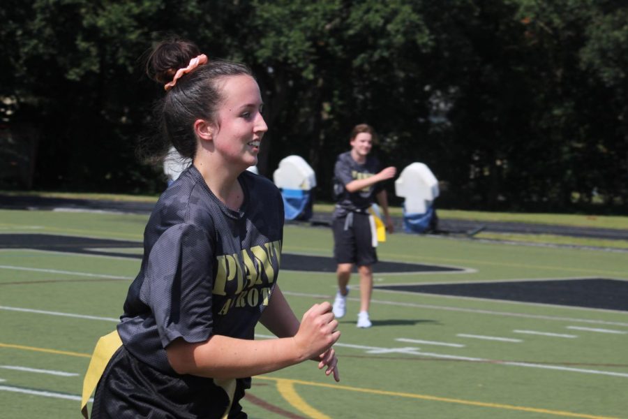In the midst of a JROTC game of flag football, senior Kailee-Rose Casey runs down the field Sept. 27. Casey hopes to pursue veterinary medicine and is looking at the University of South Florida and Florida Southern College. Photo by Libby Gough and Kate Frier.