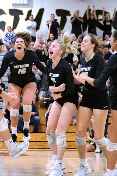 Jumping in the air, sophomore Reese Friar and seniors Elizabeth Price and Birdie Frierson celebrate after a score. The victory against Windermere meant the team won regional semi-finals. 