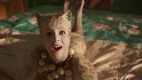 Looking up into the camera, main character Victoria (Francesca Hayward) sings in the movie adaptation of Cats. Airing in theaters in December, it was extremely unsuccessful, losing millions of dollars at the box office, as well as being pulled from its Oscar campaign with Universal Pictures. Photo courtesy of Quartz.com.