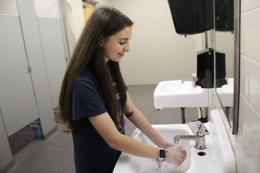 With fears of coronavirus spreading, sophomore Mariah Alvarez demonstrates proper handwashing technique. Multiple cases of the virus have been reported in both Florida and Hillsborough County.