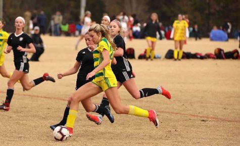 After decomitting from Ohio State University, senior soccer player Claire Rain reached back out to University of Tennessee, which had their eyes on her since her freshman year. They immediately offered her a spot for the team that was the highest ranked SEC team headed into the 2019 season.
“I chose to go to Tennessee because I wanted to be closer to home, and I wanted to play in the SEC,” Rain said. “I am looking forward to play at the college level and to grow as a player and hopefully get on the national team. I am also excited to get all the free gear.”