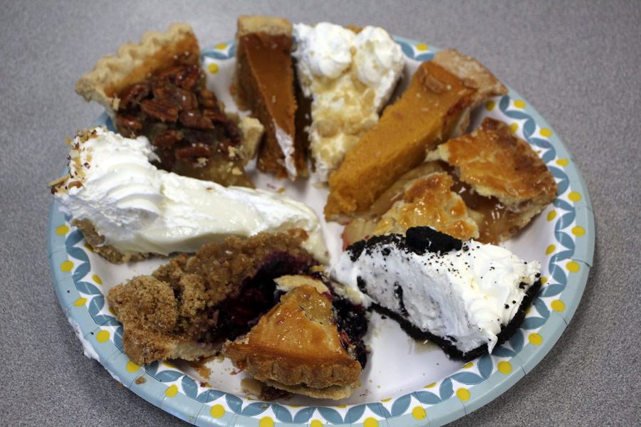 Sitting on the table, the plate is filled with the slices of pies to try. Each staffer tried nine pies. 