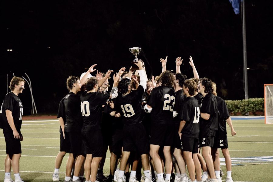 The boys lacrosse team defeated Jesuit High School 8-9 in a close battle on Wednesday, March 30. After the sold-out game, the Panthers received the Ihrig-Shaler Cup, which is awarded to the winner. 