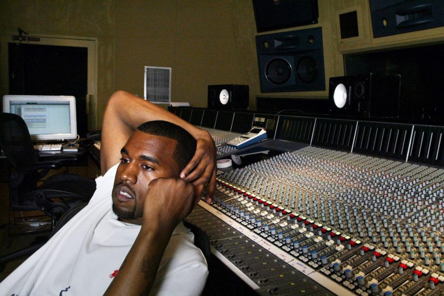  Sitting in the studio with an arm above his head, Kanye West looks in the distance. West has made many albums including, “My Beautiful Dark Twisted Fantasy”, “Ye”, “Life of Pablo” and more. Image courtesy of Rolling Stone.