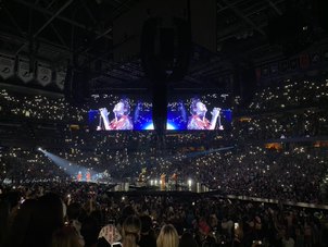 Harry Styles is singing his song “Falling” to an arena packed with thousands of fans. Love On Tour is Harry’s second solo tour and will continue until Nov. 24. 