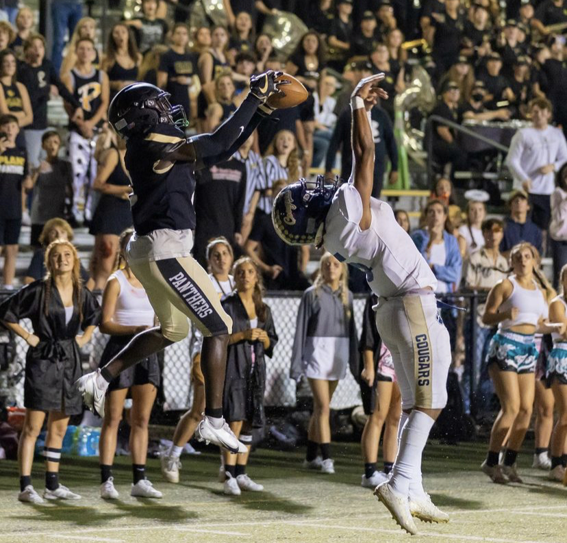 Ascending off the ground, Junior Jaquez “Quay” Kindell, brings in a last minute touchdown catch to give the Panthers the lead at the end of the game. The Panthers defeated Durant 24-21 on Friday Oct. 29, 2021.