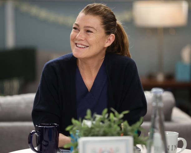 Pictured above, Meredith Grey laughs when speaking with other doctors in the attending lounge at Grey Sloan Memorial. Meredith has just recovered from COVID-19 and has returned to her job as a general surgeon. Scroll to learn more about Merediths experiences and challenges of season 18.  