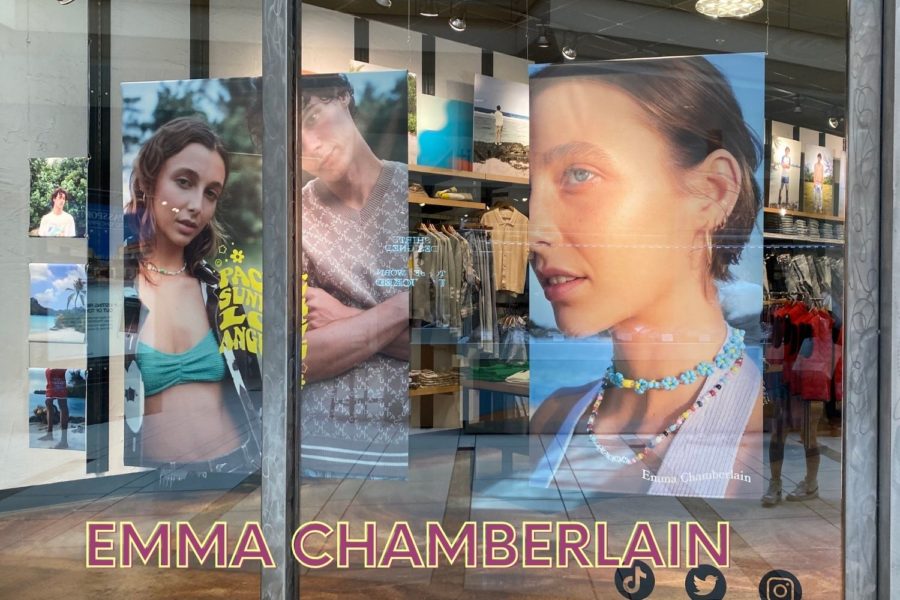 Emma+Chamberlain+models+on+posters+in+PacSun+promoting+their+new+collection.+Chamberlain+is+famous+for+her+style%2C+YouTube+videos%2C+podcasts%2C+coffee+company%2C+and+so+much+more.++