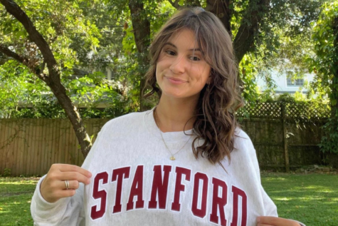 Senior, Grace de la Torre, poses with her Stanford crewneck. After a long, tiring process, De La Torre finally committed to a school to continue her athletic and academic career.