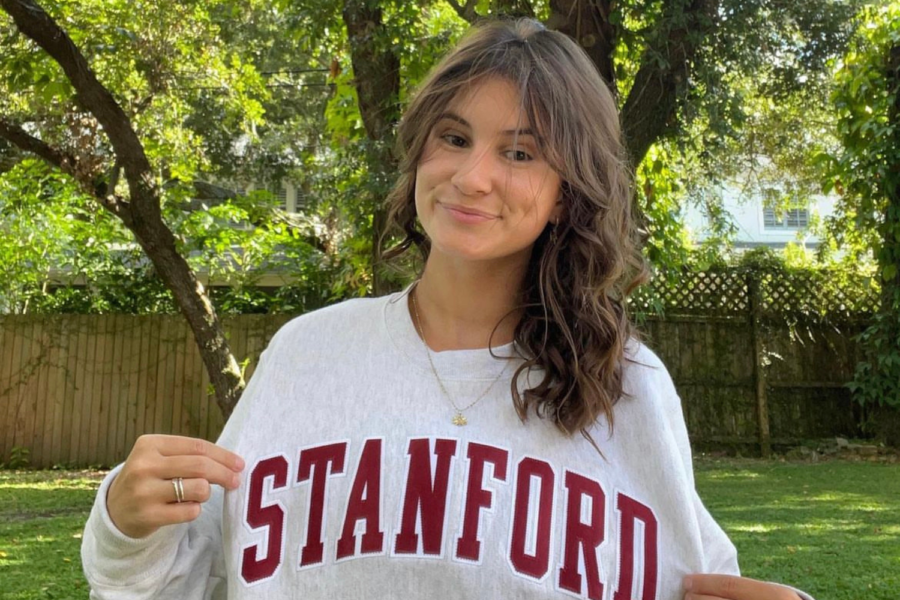Senior%2C+Grace+de+la+Torre%2C+poses+with+her+Stanford+crewneck.+After+a+long%2C+tiring+process%2C+De+La+Torre+finally+committed+to+a+school+to+continue+her+athletic+and+academic+career.