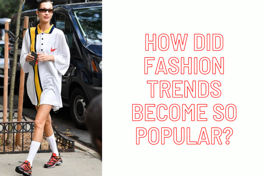 Bella+Hadid+wearing+an+oversized+Nike+polo+shirt+while+strolling+through+New+York.+She+finished+the+look+with+orange%2C+black+laced+sneakers+and+black+rectangular+sunglasses.+Her+shirt+is+practically+a+dress+on+her%2C+and+she+looks+very+comfortable.
