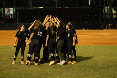 Plant softball has been chasing a district win in the post-season and finally attained the goal last year, pictured here celebrating after knocking out Alonso. This season with six seniors on the verge of graduation, the Panthers are more driven than ever to take states.  
