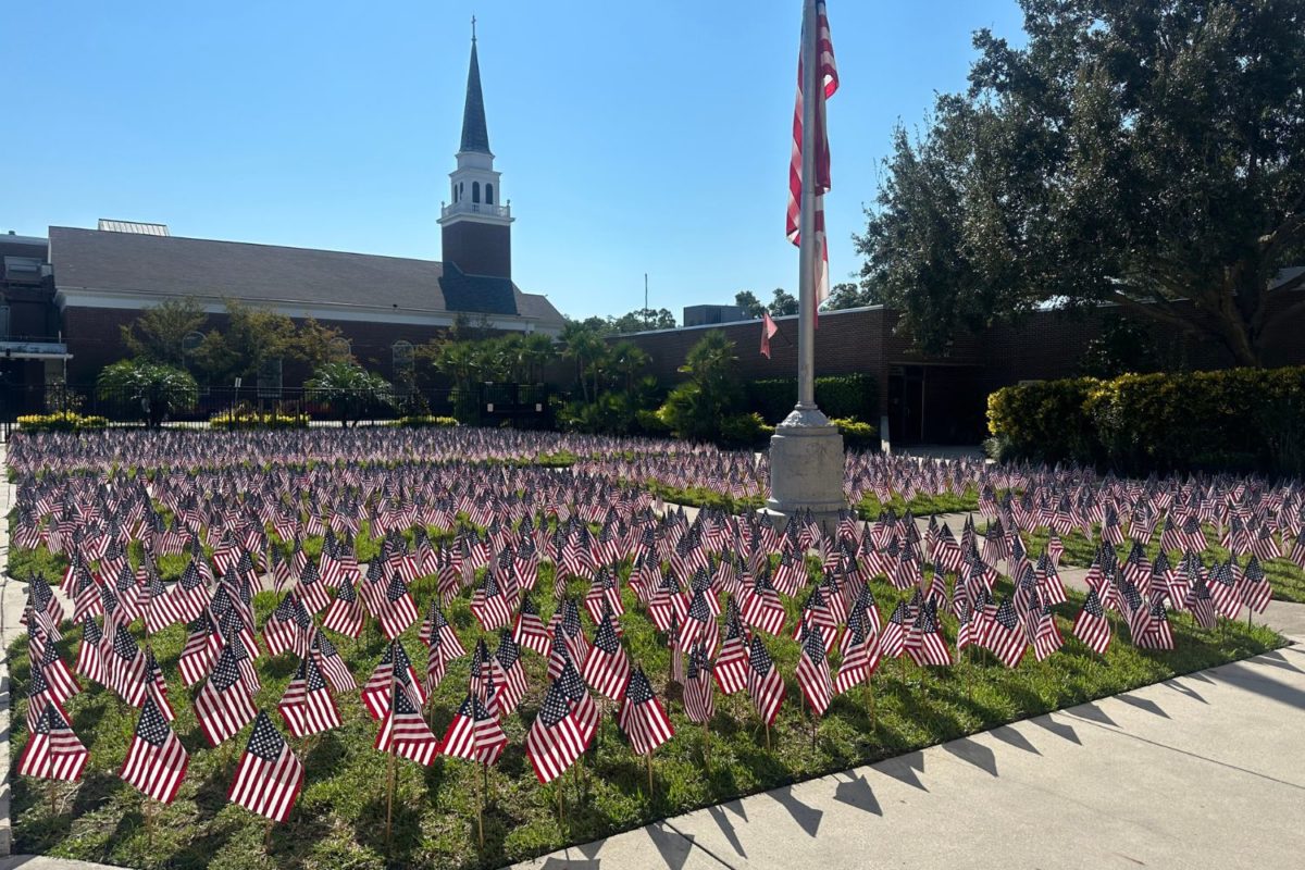2%2C977+American+Flags+are+put+on+display+at+the+front+entrance+of+Plant+High+School.+To+honor+all+the+lives+lost+in+the+9%2F11+terrorist+attacks%2C+students+and+faculty+at+the+school+gather+annually+to+set+up+the+display.++