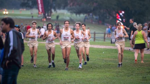 Above, Plant Varsity Cross Country is seen warming up for the FSU Pre-State. They are seen getting ready to run the race.