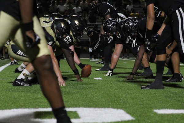 The Plant Panthers prepare to snap the ball in one of their regular season games. The record of the team being 11-2 is the reason they have been able to get so far into the playoffs. 