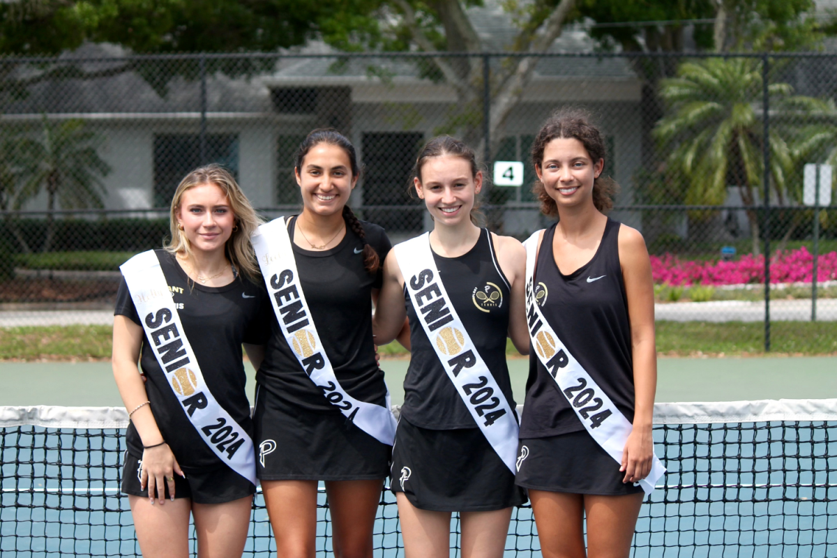 The+seniors+on+the+Girls+Tennis+Team+posed+for+a+picture+to+commemorate+their+time+spent+on+the+team.+Plant+would+go+on+to+win+the+match+five-two+against+their+rivals.+