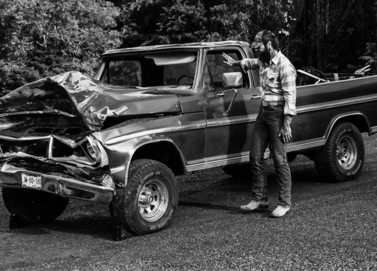 Post Malone stands next to the Ford Truck used for his cover of his latest album, “F-1Trillion”. The iconic truck is featured on both Malone’s original album as well as the extended edition.