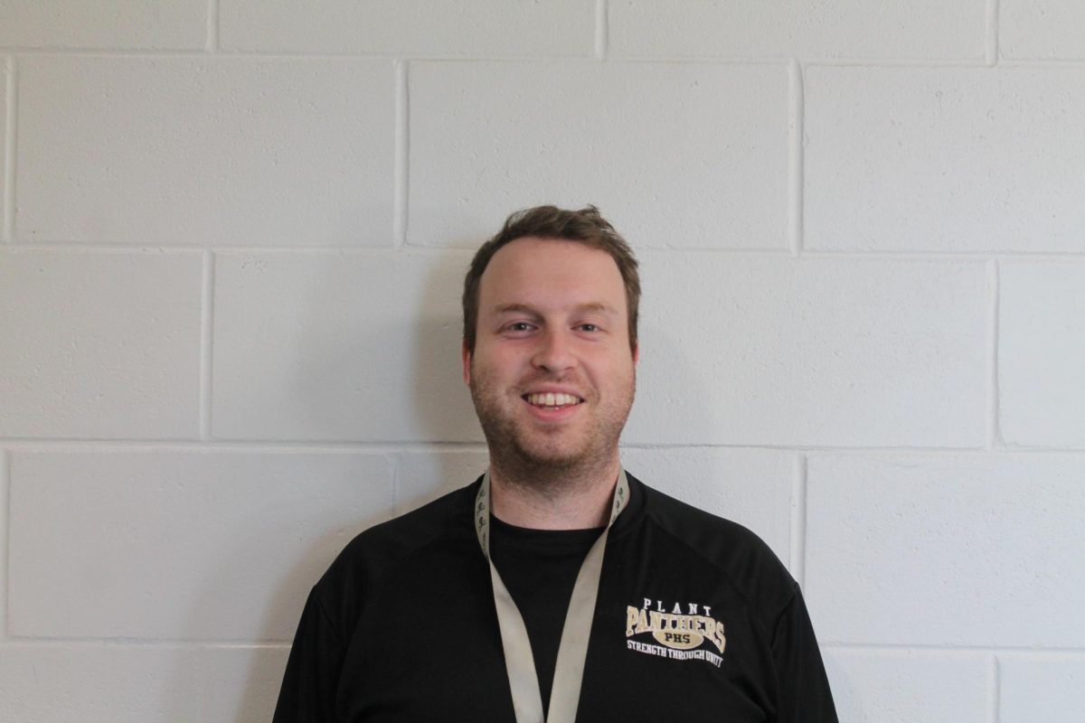 In the photo stands Benjamin Sheiket, one of the newest additions to the Plant staff this year. Sheiket is teaching his first year of AP European History, a majority senior class.