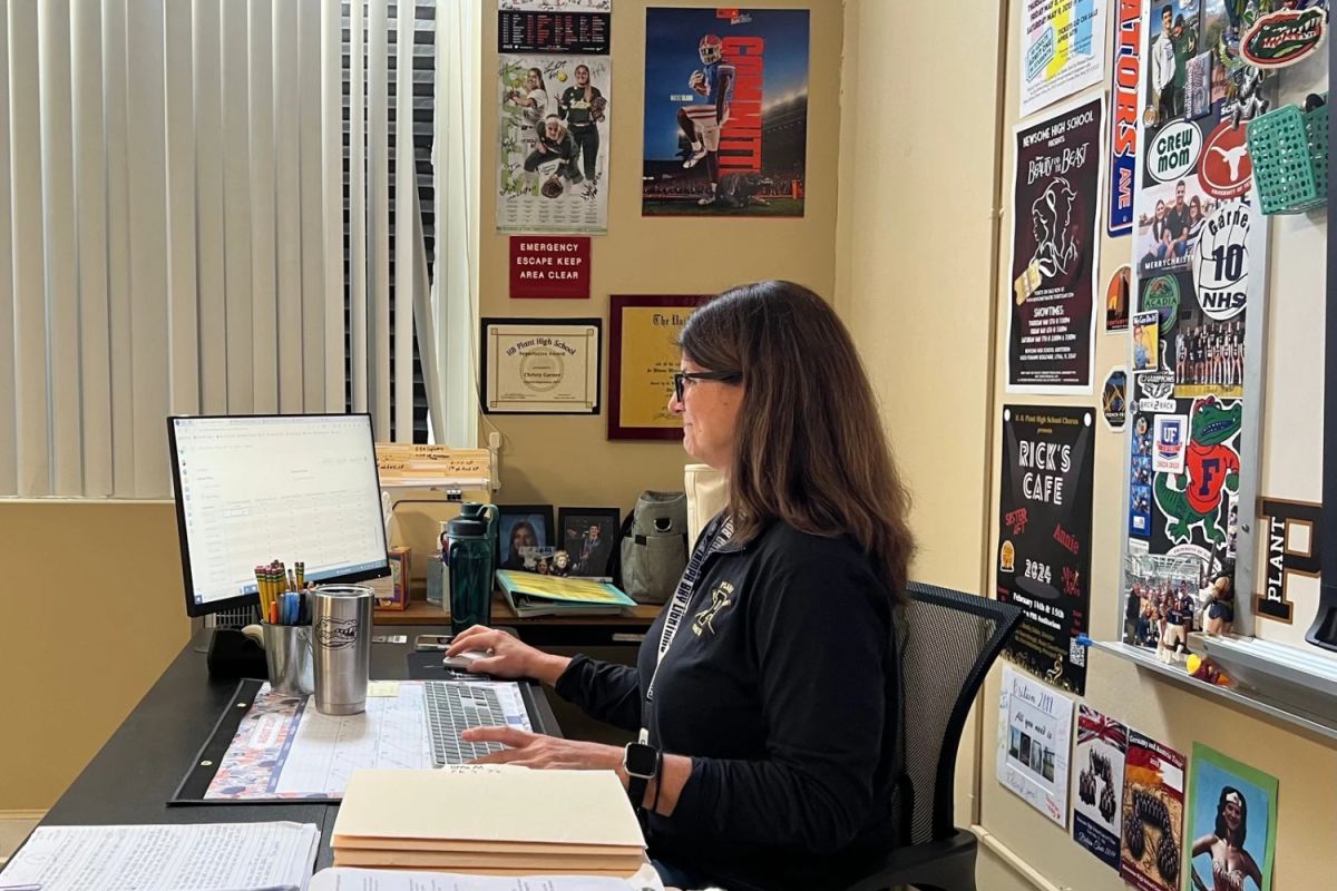 Christy Garner sits at her desk as her ELA class works on classwork. Garner has been a teacher at Plant for two years.