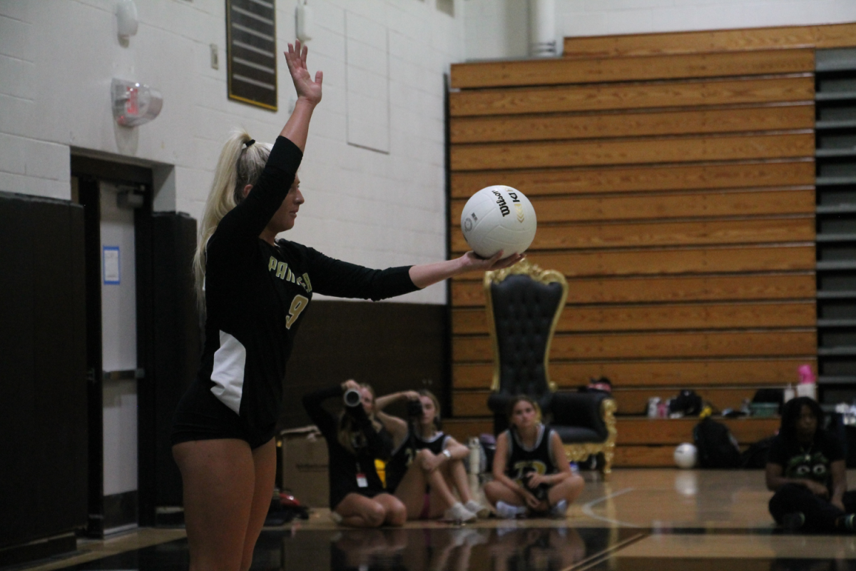 Senior Liv Lambert prepares a serve for the Steinbrenner Warriors to receive. Lambert would help lead her team to victory at Wednesday’s game. 