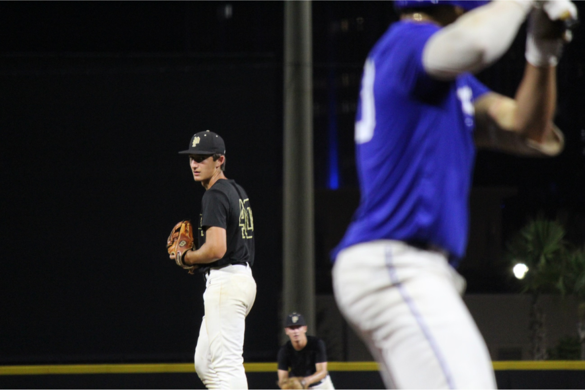 Adler Brun (11) prepares to throw a pitch against Jesuit. Brun just began his third year playing for the Plant Panthers.