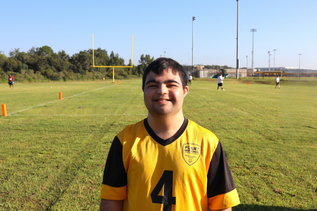 Athlete, Nick Varjabedian, smiles for the camera during Special Olympics first tournament of the season. Plant Speical Olympics brought home three wins as well as the tournament champions for the Seniors group.