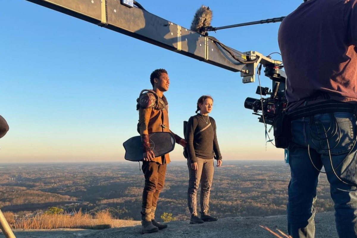 Actors, Kieth Powers and Joey king stand on a mountain while filming "Uglies". Uglies was released on Sept.13 and is a movie adaptation of the popular young adult dystopian novels written by Scott Westerfeld.  