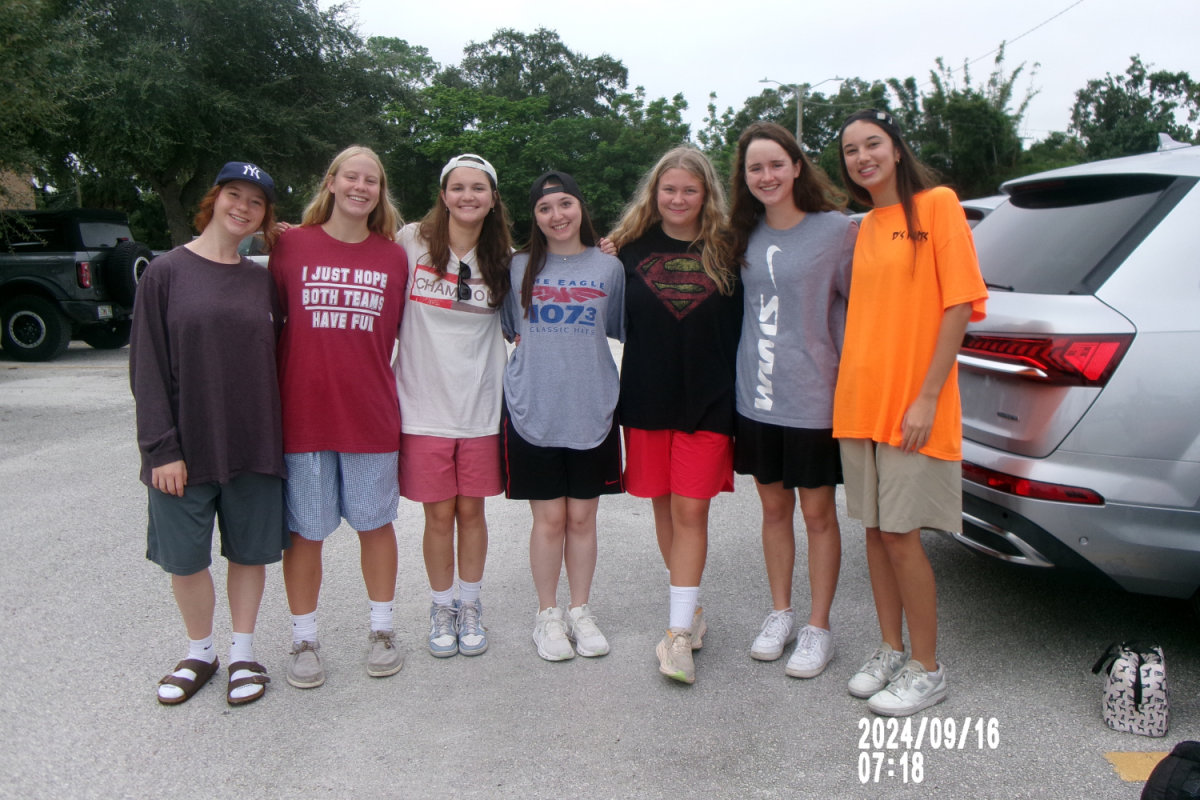 Seniors gather in the school parking lot for their final Adam Sandler Day at Plant High. Adam Sandler Day started Plant’s fall Homecoming week. 