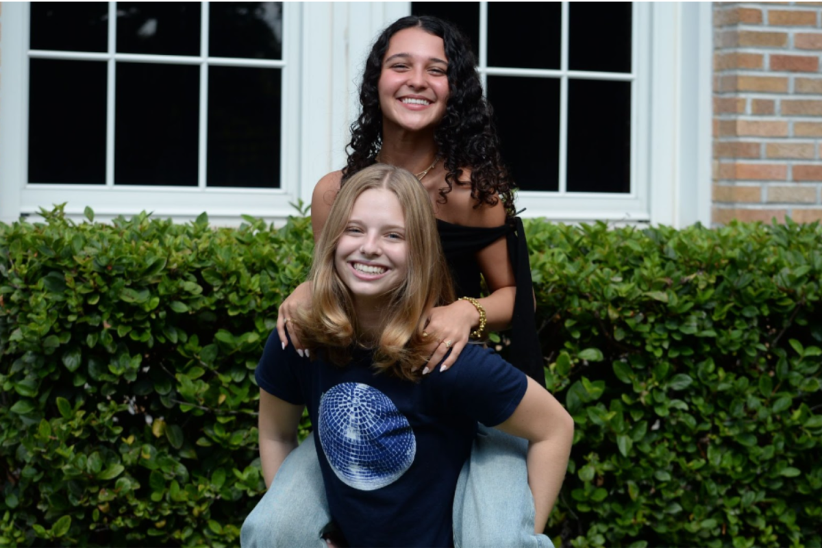 Seniors Bella Johnson and Ellianna Valkenburg pose for a photo. Johnson and Valkenburg were chosen as 2024-2025 Co-Editor-In-Chiefs.