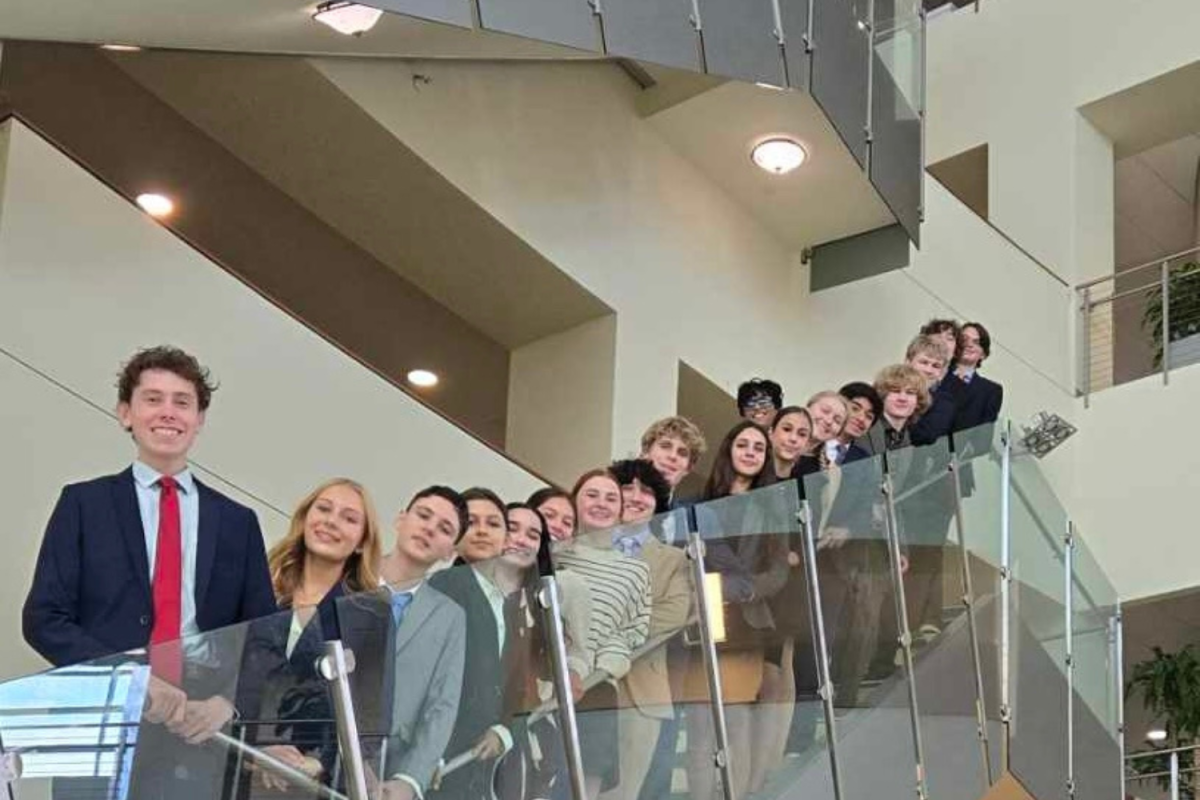 MUN participants smile during BullsMuN II. Achievements: Colin Felscher and Samantha Iglesias as Switzerland, best outstanding delegates and best position papers; Hope Brillhard and Sophie Girenkova as Laos, honorable mention; and Neil Agarwal as Singapore, verbal commendation. 