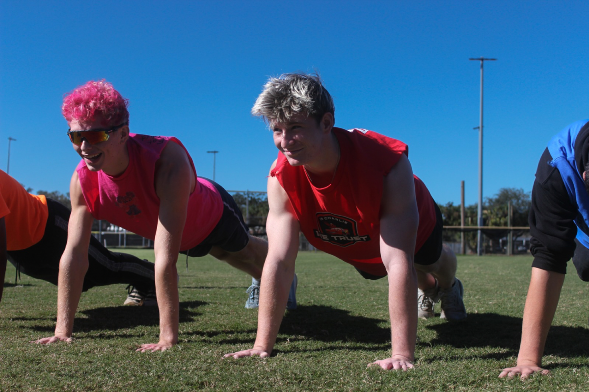 Seniors William Baker and Andrew Brown compete in a plank-holding contest. Baker won by a minute.