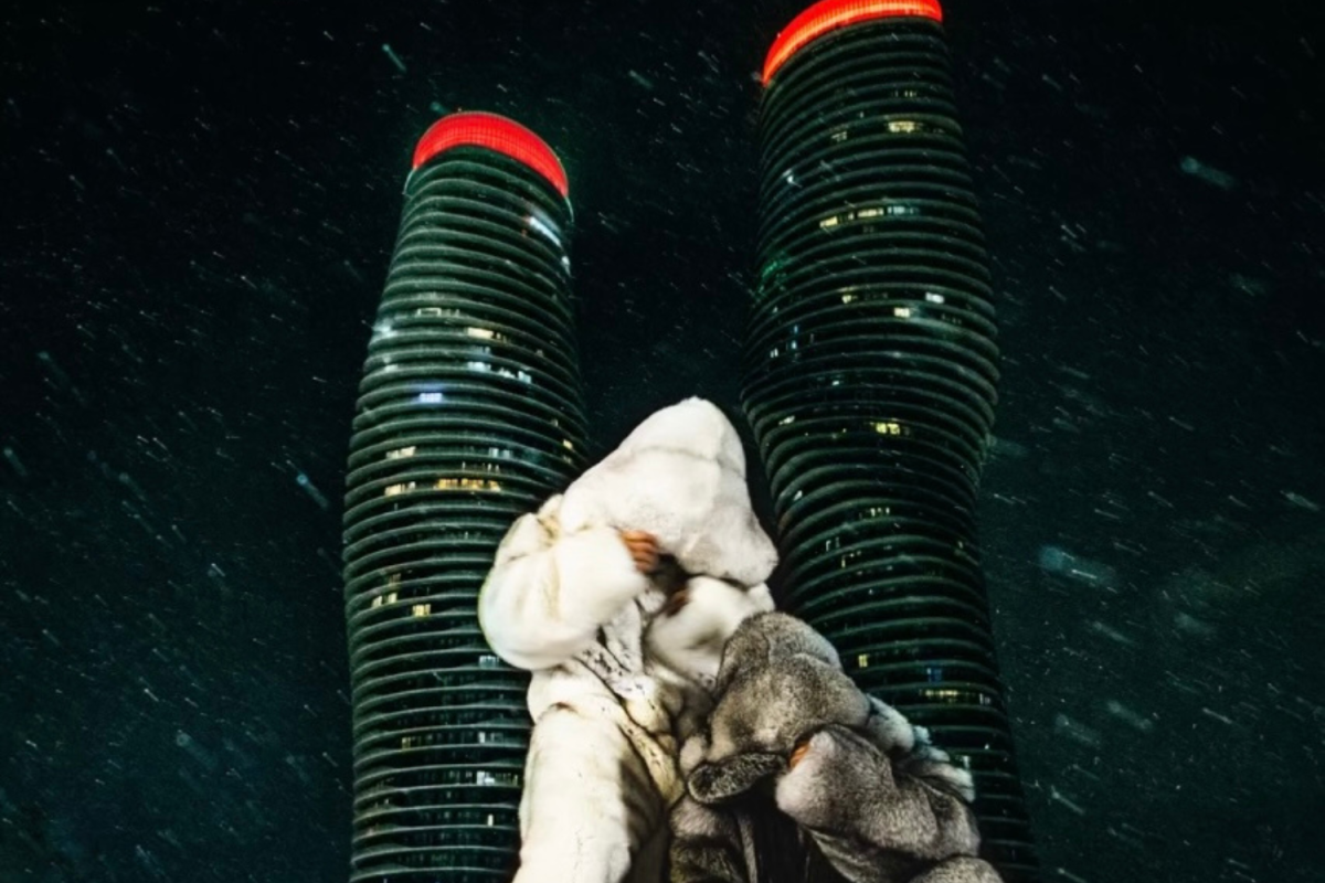 The top of the CN Tower on Drake's album cover for 'Some Sexy Songs 4 U' glows red, aligning with the first song's lyrics, 'CN Tower.' The image of Drake and PartyNextDoor  posed in oversized, fuzzy jackets captured a blend of city chic and luxury against the city's familiar skyline.