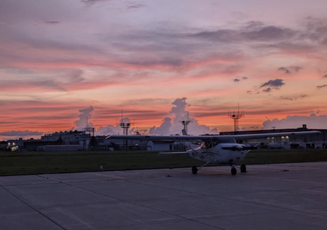 Henry Johnson (12) captures a photo of his training airplane. Johnson trained for his pilot's license at Purdue University in West Lafayette, Ind. 