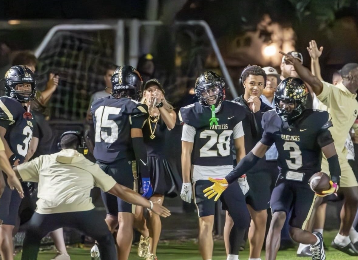 Duran Manuel (12) celebrates a big time play with a turnover. That was a successful play to lead Plant to victory. 