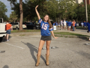 Reeves smiles since she is excited to see the University of Florida’s first football game of the season. On Aug. 30, 2025, the University of Florida won this game against the Long Island University Sharks. 