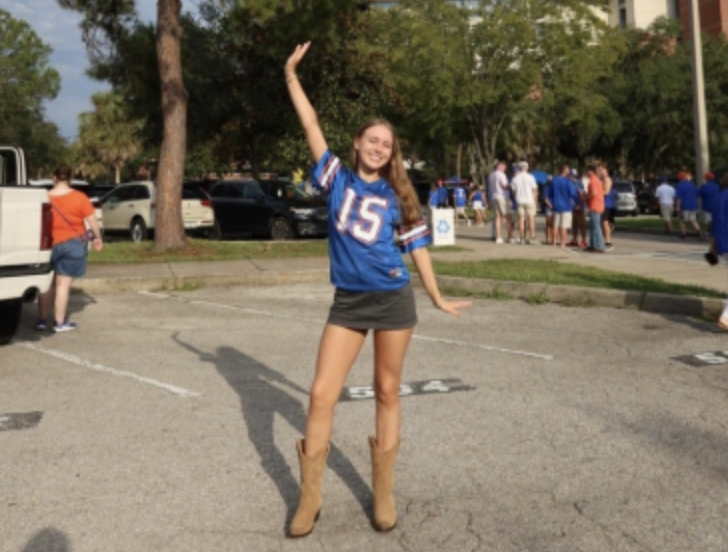 Reeves smiles since she is excited to see the University of Florida’s first football game of the season. On Aug. 30, 2025, the University of Florida won this game against the Long Island University Sharks. 